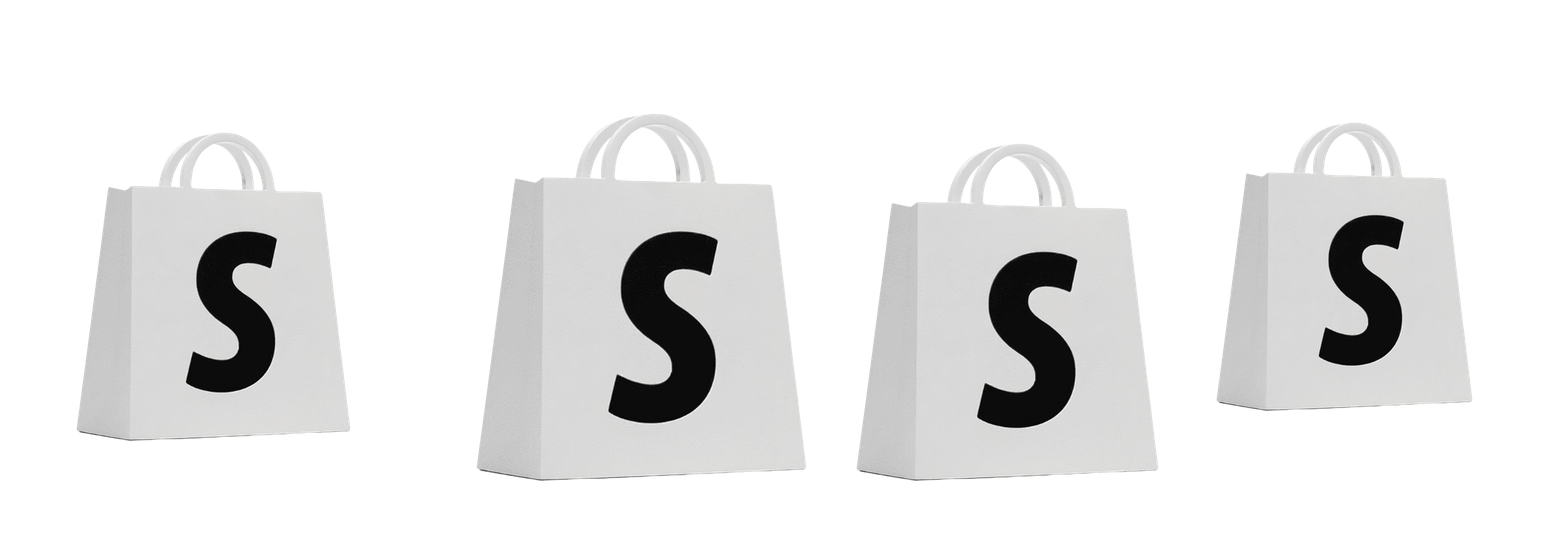 Four Shopify milestone award trophies arranged in a row